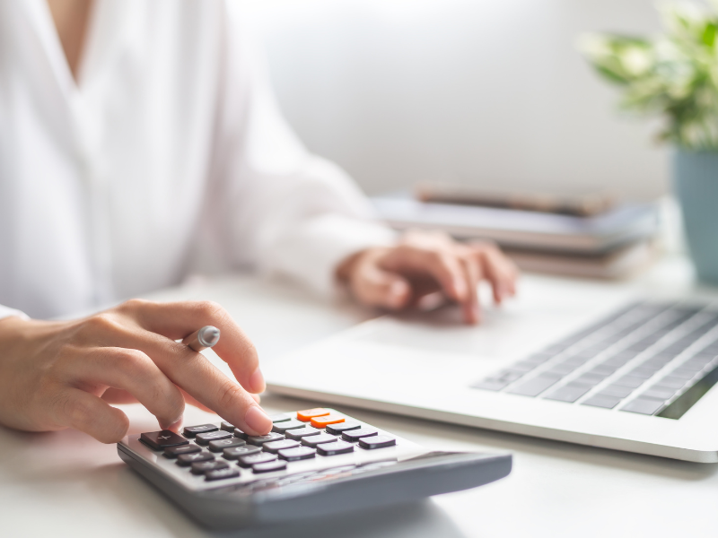 Woman using a calculator.